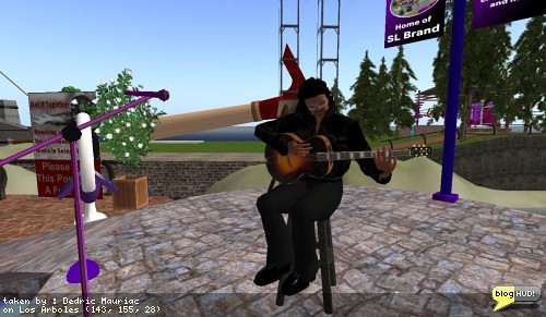 Joaquin Gustav plays on his Spanish Guitar